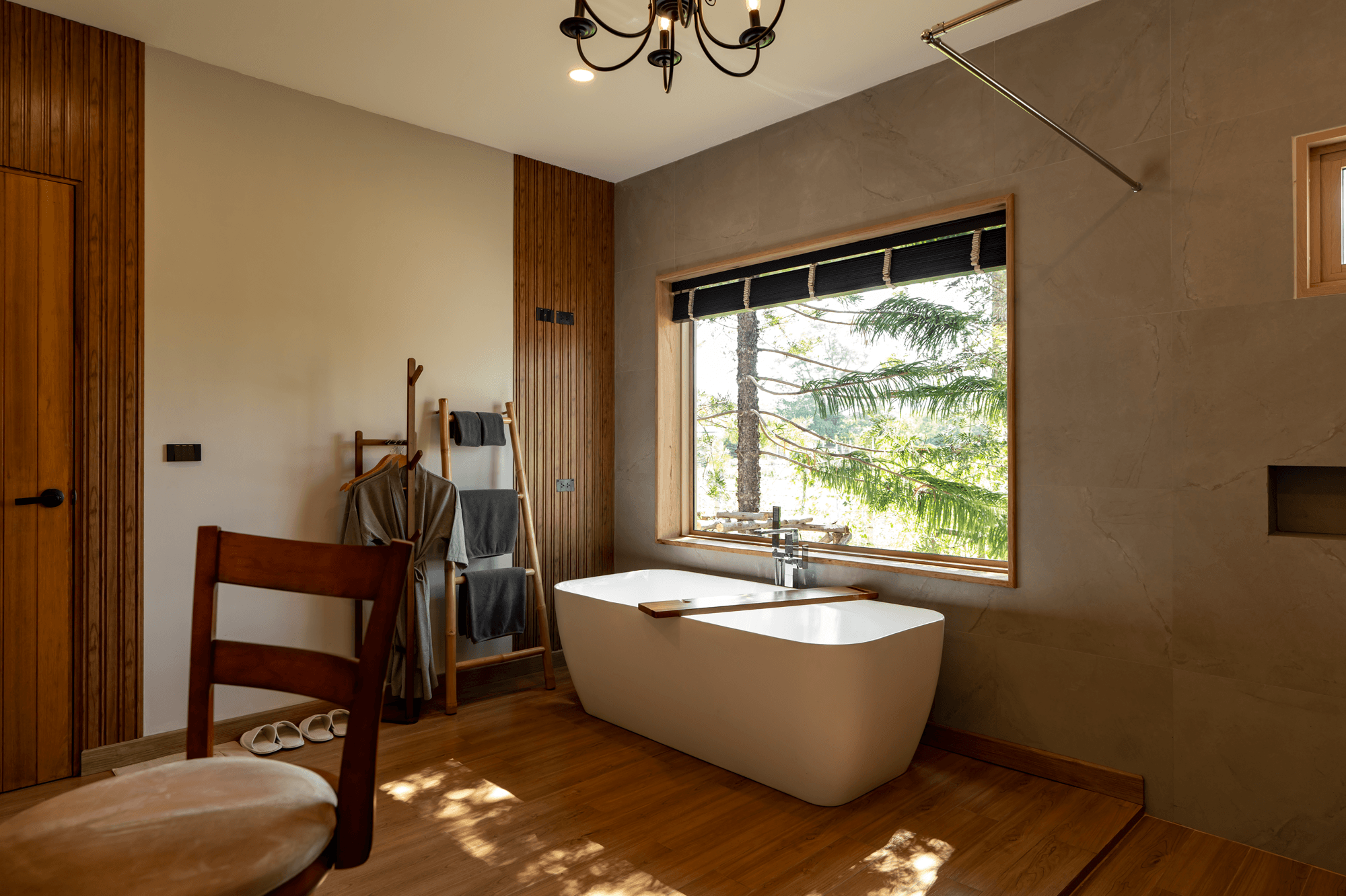 Bathtub with garden window view