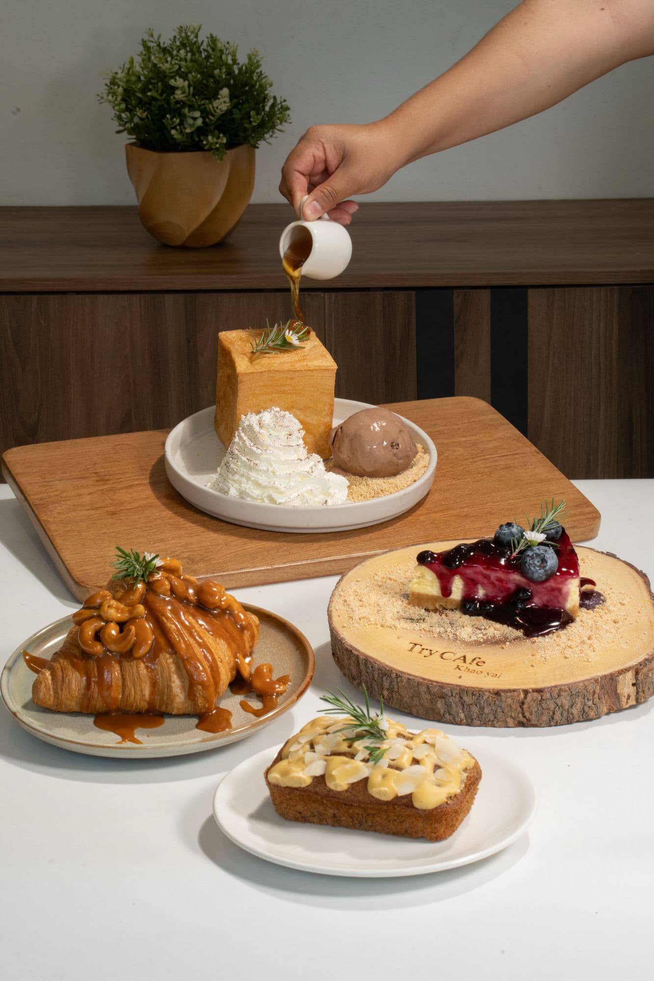 Pastry spread — toast brick, caramel croissant, blueberry cheesecake, banana cake
