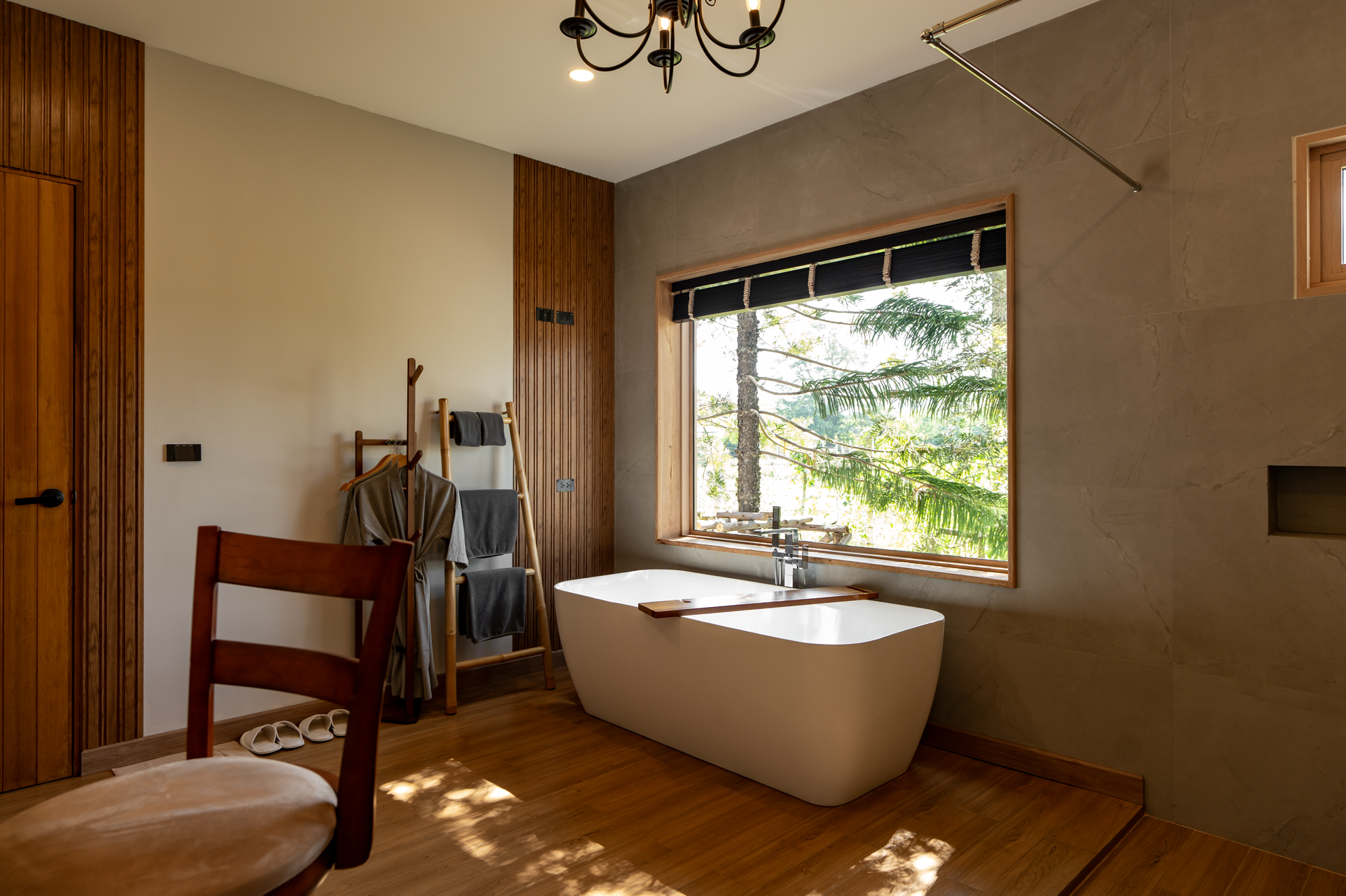 Bathtub with garden window view
