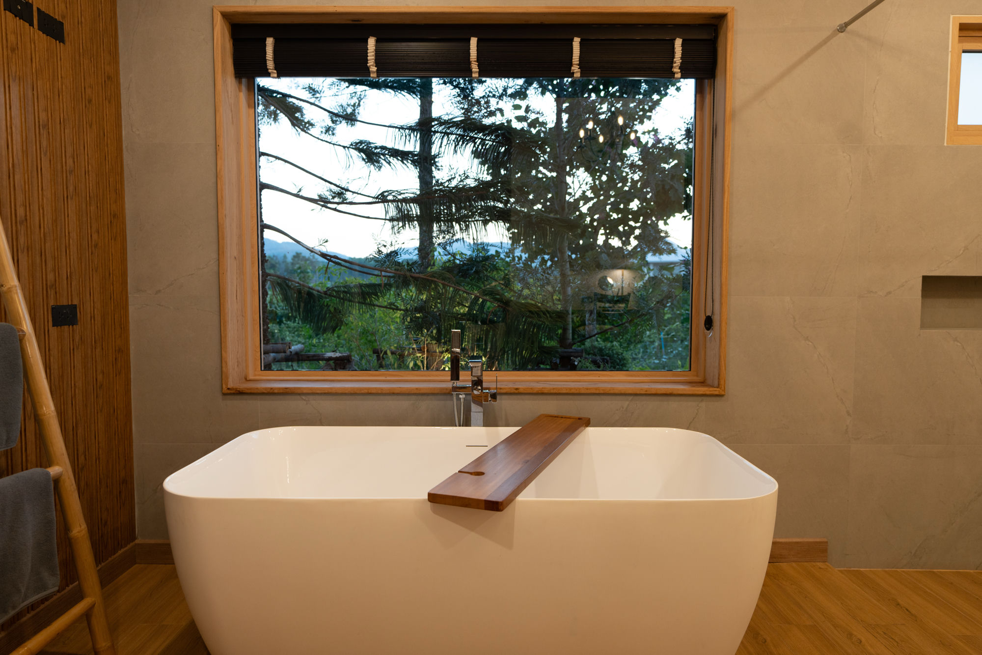 Outdoor bath with pine view