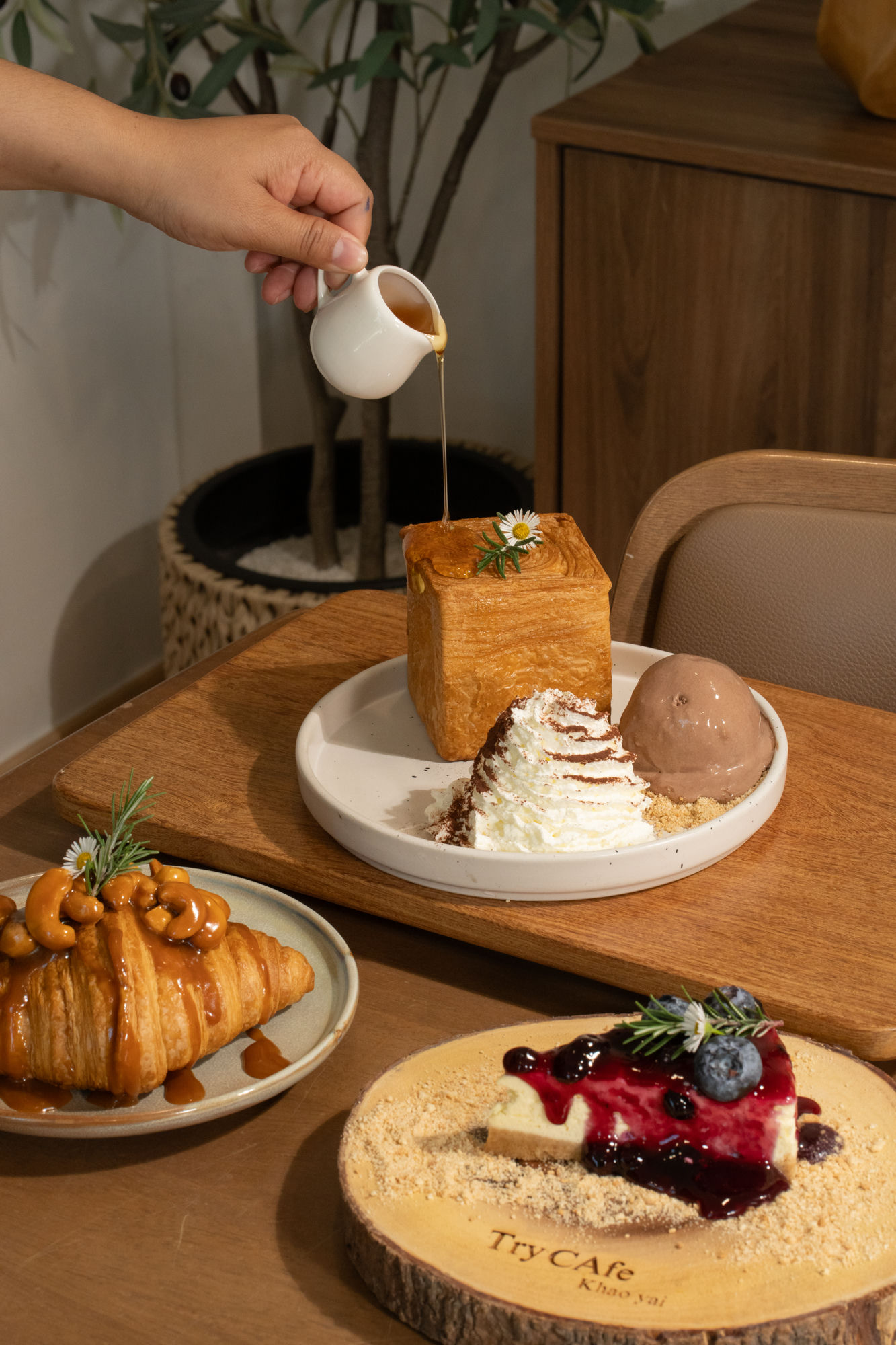 Honey toast brick, caramel croissant and blueberry cheesecake at Try Cafe