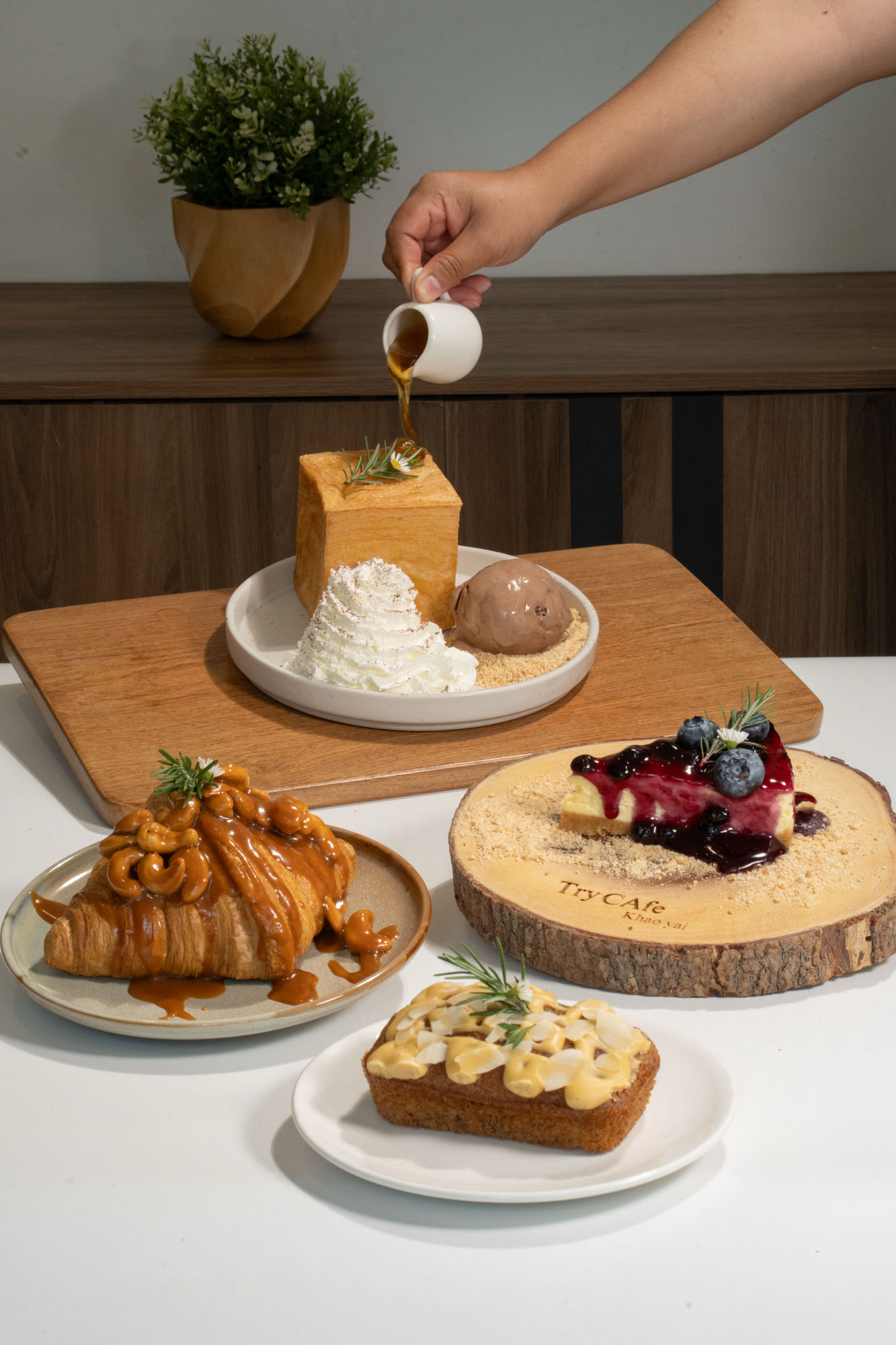 Pastry spread — toast brick, caramel croissant, blueberry cheesecake, banana cake