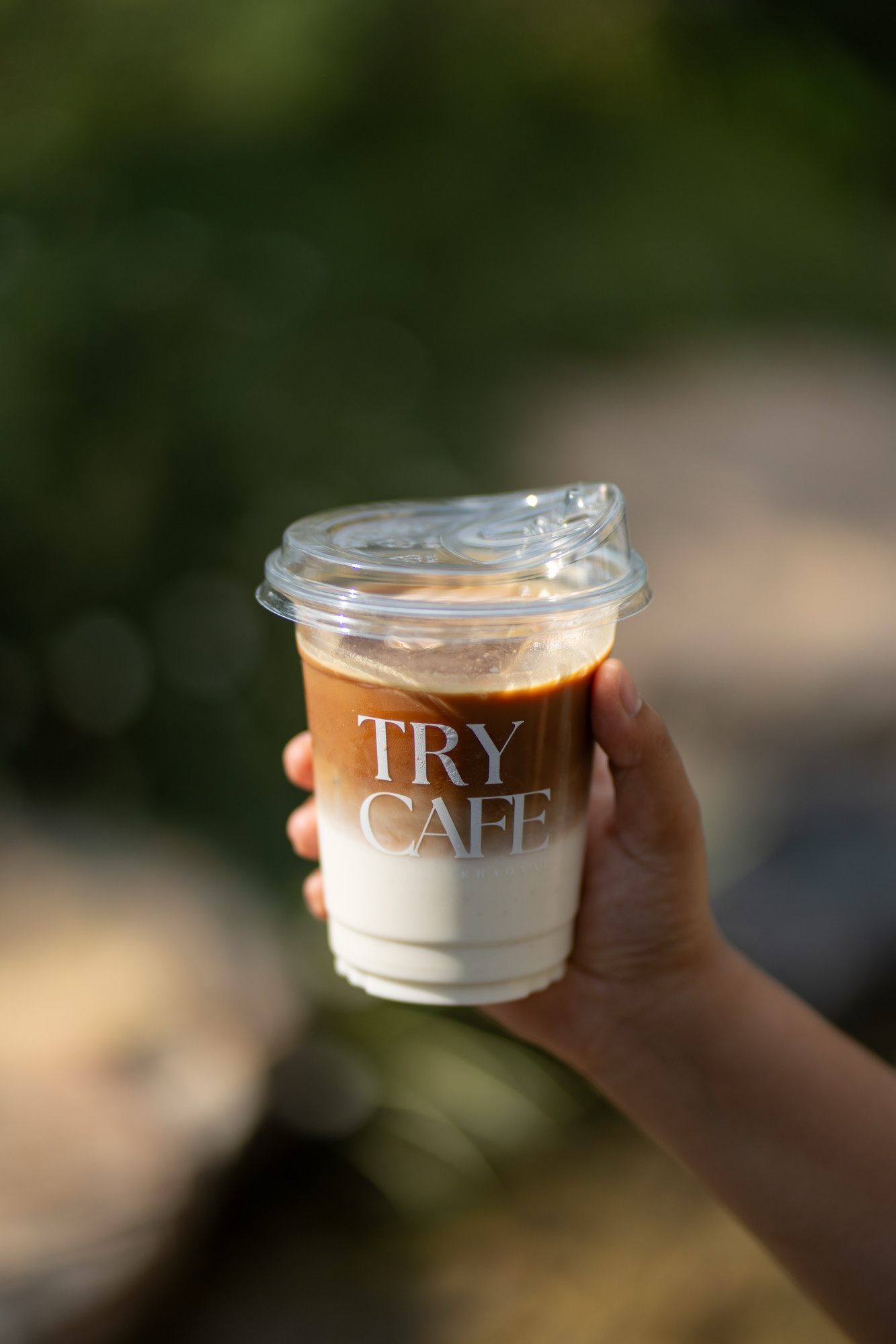 Iced caramel latte with art on top
